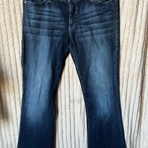 Dark Indigo Boot Cut Jeans Rack by Wrangler.